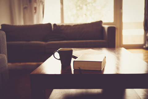 Coffee and book on a table