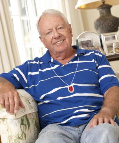 Elderly man wearing a Telecare Pendant