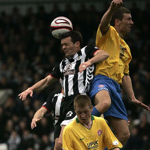 Football player making a header