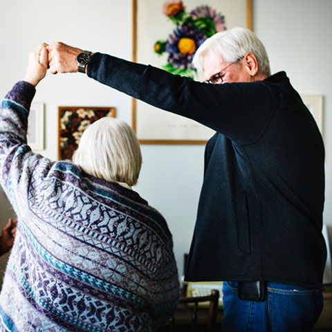 Elderly couple dancing