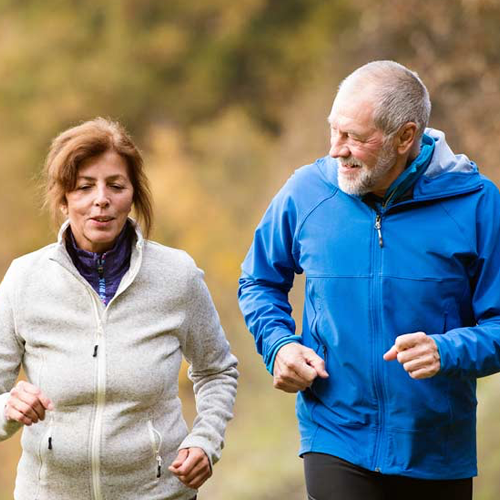 Elderly couple jogging