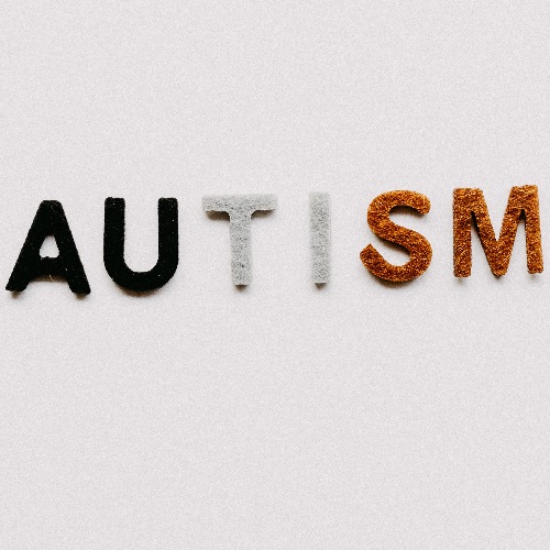 word autism on a white background for autism awareness