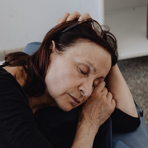 elderly woman experiencing insomnia