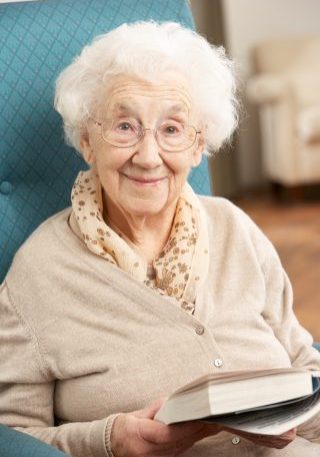 Elderly lady reading